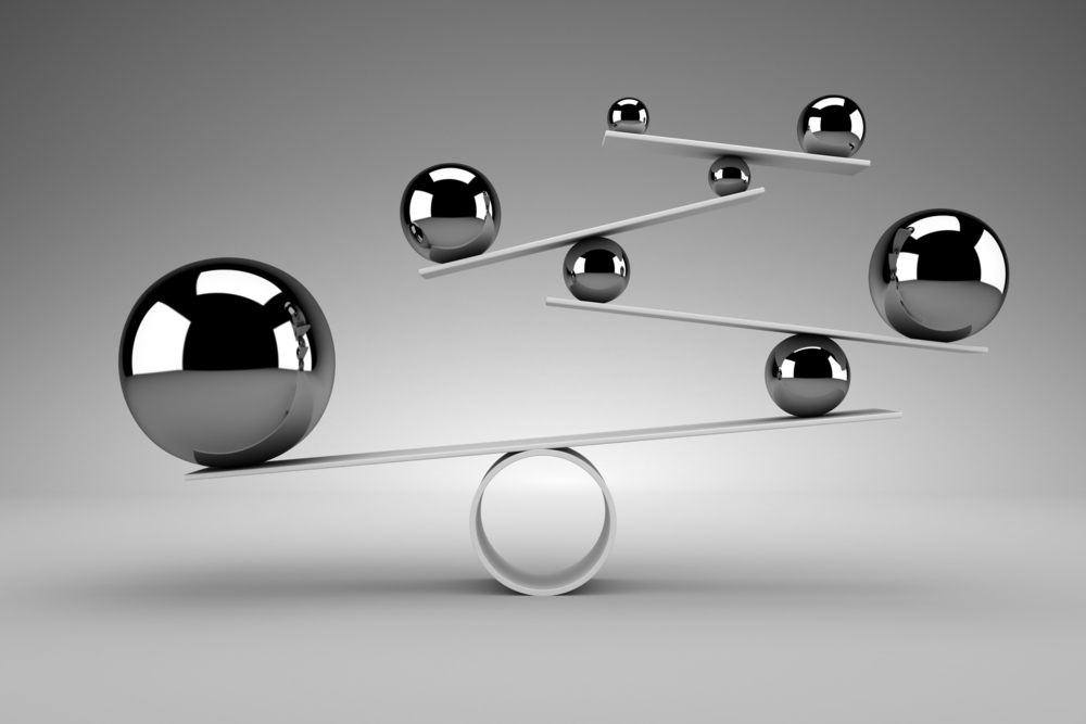Exposing The Myth of the “Expert” Who Understands the Human Body 4 Picture of a carefully balanced balls on fulcrums