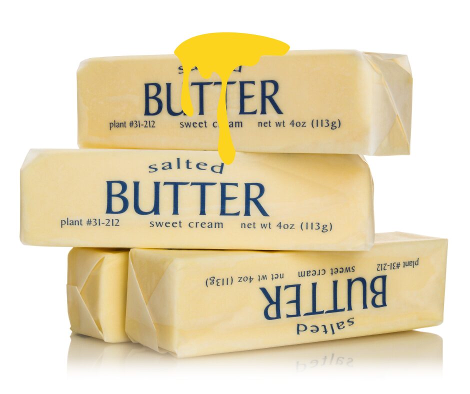 Stack of butter representing saturated fats, which are solid at room temperature and commonly found in animal products and dairy.